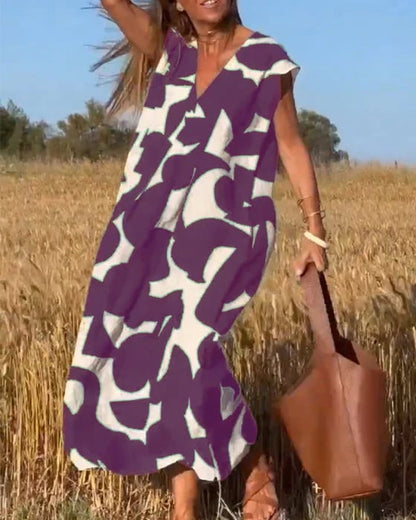 💕Sukienka z nadrukiem z dekoltem w szpic👗